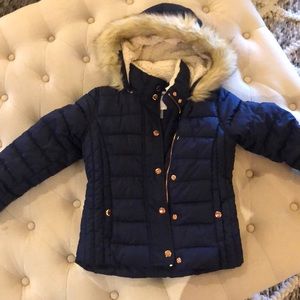 Navy puffer coat, never worn.